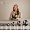 Gamme de plaques funéraires circulaires or avec portrait de gendarme, présentée en 5 tailles progressives du XS au 3XL, finition chromée dorée