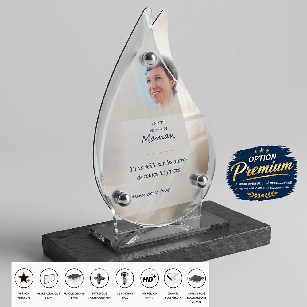 Plaque funéraire flamme Soignant finition premium présentée sur socle en ardoise