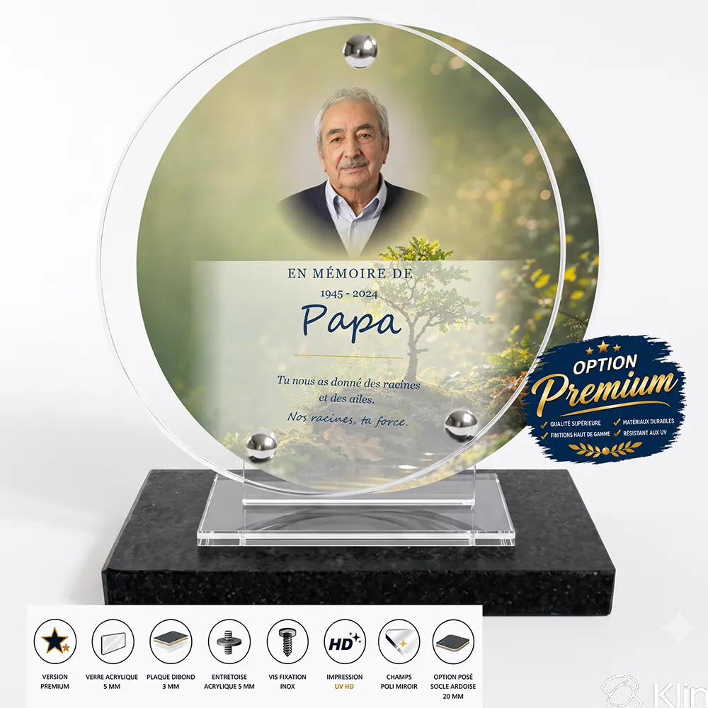 Plaque funéraire circulaire Arbres finition premium présentée sur socle en ardoise