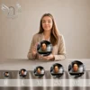 Gamme de plaques funéraires circulaires médaillon avec portrait et motif d'oiseau, finition or, présentées en cinq tailles du M au 3XL
