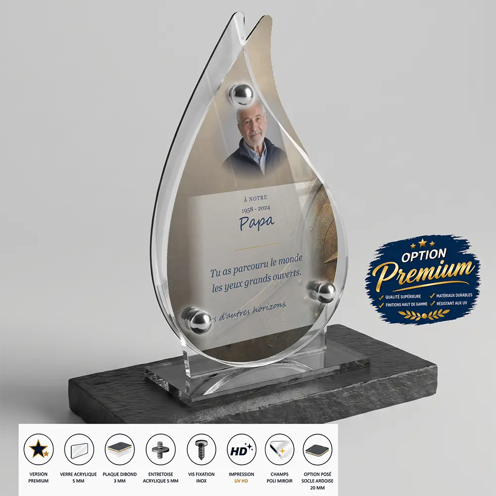 Plaque funéraire flamme Voyage finition premium présentée sur socle en ardoise