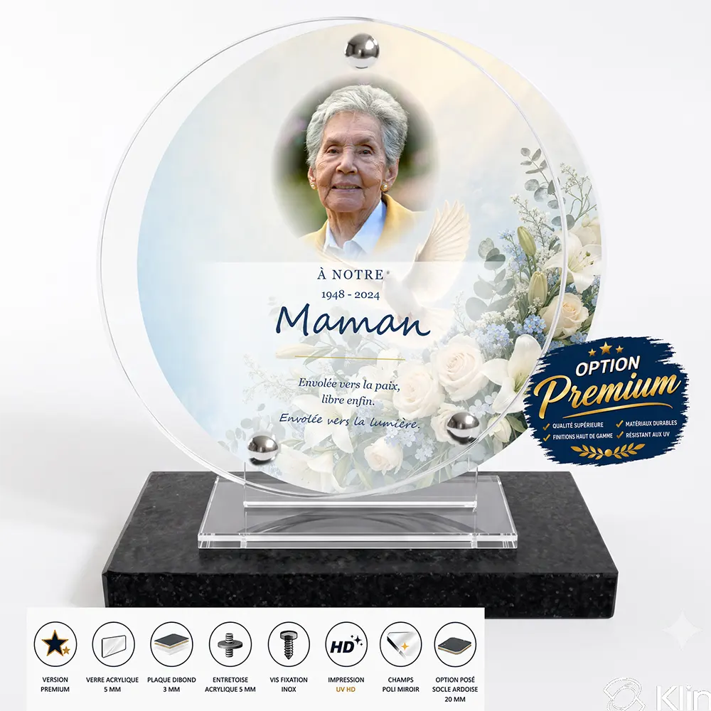 Plaque funéraire circulaire Colombe finition premium présentée sur socle en ardoise