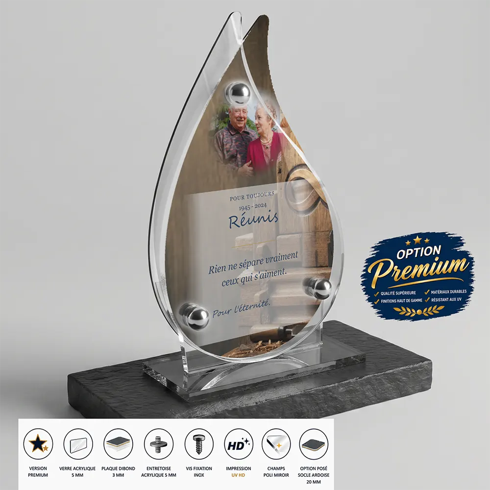 Plaque funéraire flamme Infini finition premium présentée sur socle en ardoise